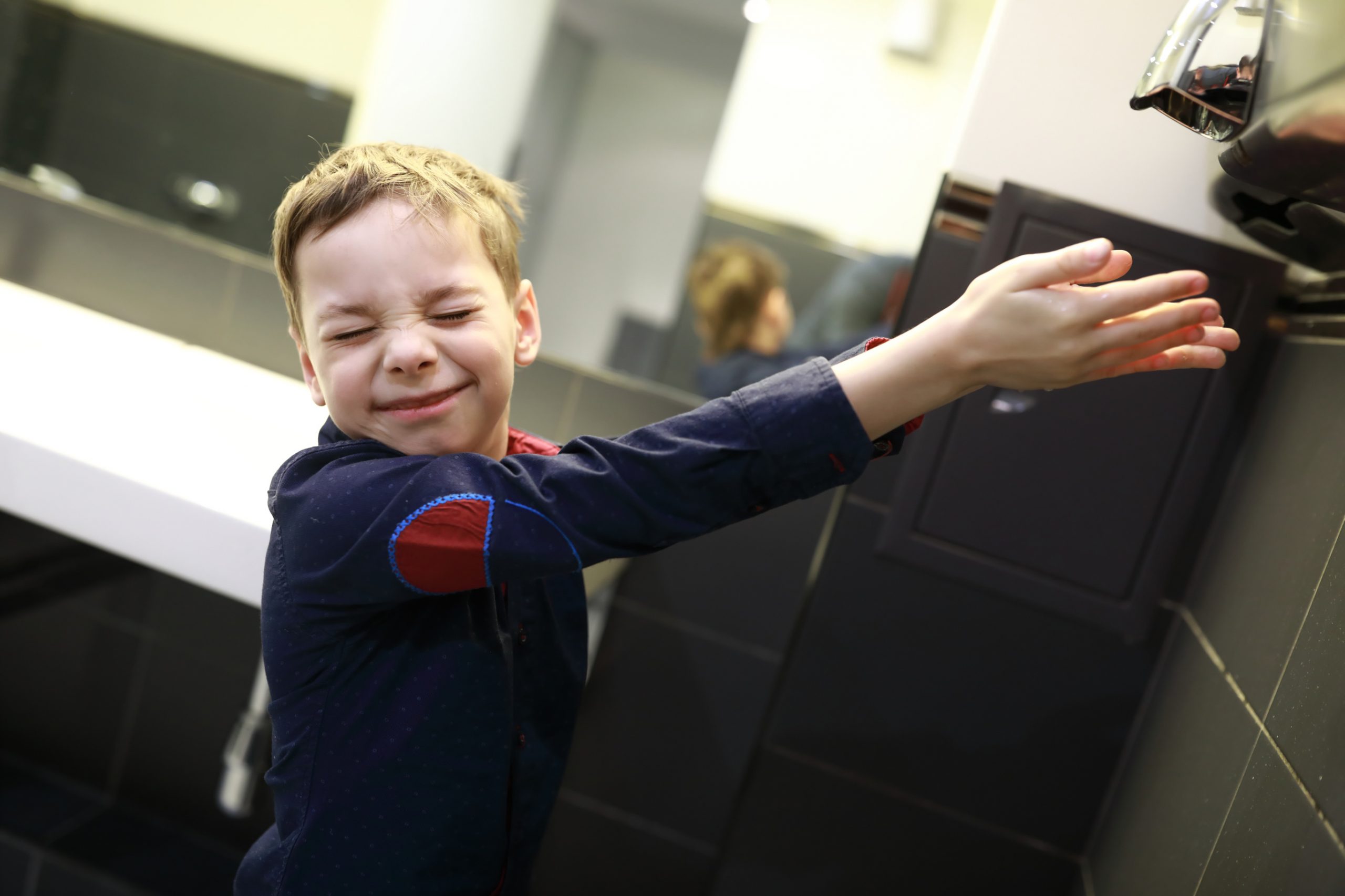 boy drying hands